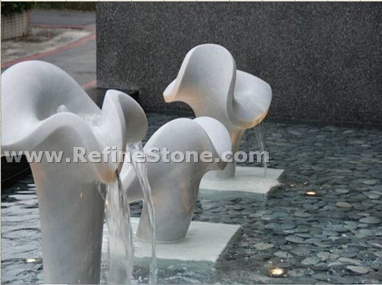 Pure white marble water fountain