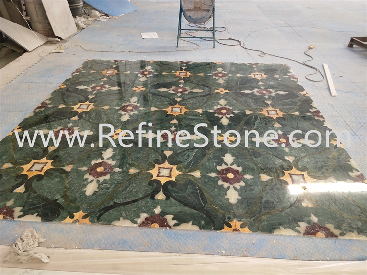 Green marble medallion floor tiles