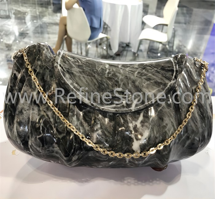Grey marble bag sculpture